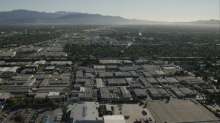 CAP_004_002 - HD stock footage aerial video of flying over warehouse buildings in Van Nuys, California