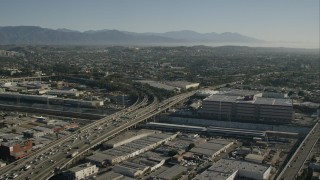 CAP_004_021 - HD stock footage aerial video flyby light traffic on freeway through Boyle Heights, Los Angeles, California