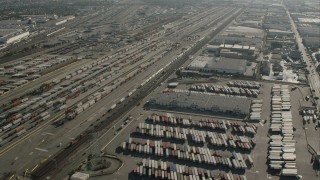 CAP_004_025 - HD stock footage aerial video flyby rows of shipping containers at a train yard in Vernon, California