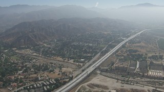 CAP_006_004 - HD stock footage aerial video of suburban neighborhoods and the 210 freeway in Lake View Terrace, California