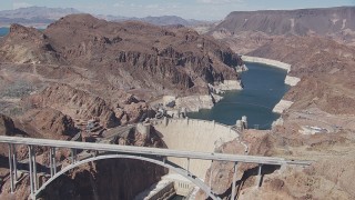 CAP_008_001 - HD stock footage aerial video of the Hoover Dam Bypass bridge and the Hoover Dam, Nevada