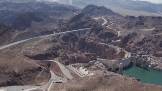 CAP_008_009 - HD stock footage aerial video of a wide view of the Kingman Wash Access Road, Hoover Dam, and the bypass bridge, Nevada