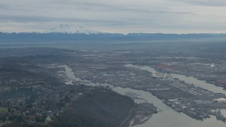 CAP_009_022 - HD stock footage aerial video of the Port of Tacoma and Mount Rainier in Tacoma, Washington