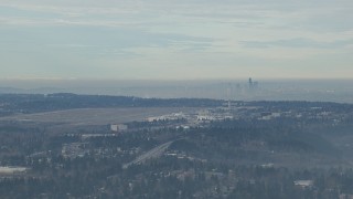 CAP_009_030 - HD stock footage aerial video of Seattle Tacoma Airport and the Downtown Seattle skyline seen from south of the city, Washington