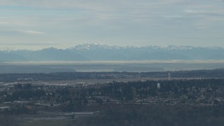 CAP_009_034 - HD stock footage aerial video of the Olympic Mountains seen from the Seattle Tacoma Airport, Washington