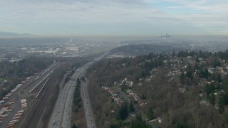 CAP_009_038 - HD stock footage aerial video of Downtown Seattle skyline seen while following I-5 to Boeing Field, Washington