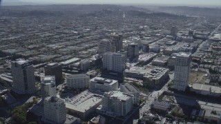 CAP_012_008 - HD stock footage aerial video of tall office buildings beside the 134 freeway in Glendale, California