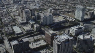 CAP_012_009 - HD stock footage aerial video flyby tall office buildings beside the 134 freeway in Glendale, California