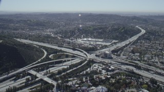 CAP_012_010 - HD stock footage aerial video of the 2 and 134 freeway interchange in Glendale, California