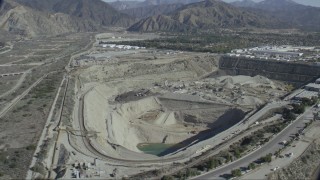 CAP_012_018 - HD stock footage aerial video of passing a quarry in Asuza, California