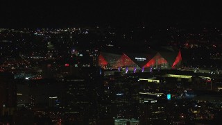 CAP_013_001 - HD stock footage aerial video of Mercedes Benz Stadium at night in Atlanta, Georgia