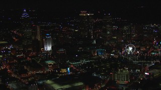 CAP_013_025 - HD stock footage aerial video of passing city buildings and skyscrapers at night, Downtown Atlanta, Georgia