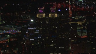 CAP_013_034 - HD stock footage aerial video fly away from 191 Peachtree Tower, reveal SunTrust Plaza at night, Downtown Atlanta, Georgia