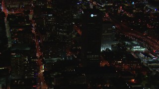 CAP_013_038 - HD stock footage aerial video of AT&T Center skyscraper at night, Midtown Atlanta, Georgia