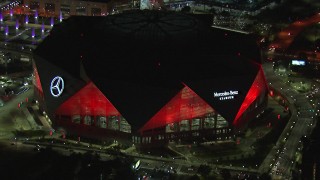 CAP_013_051 - HD stock footage aerial video of slowly orbiting the stadium at nighttime, Atlanta, Georgia