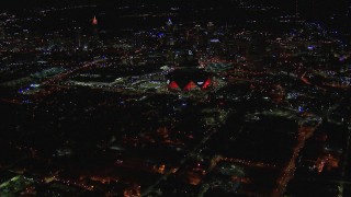 CAP_013_053 - HD stock footage aerial video of flying toward the stadium at nighttime, Atlanta, Georgia