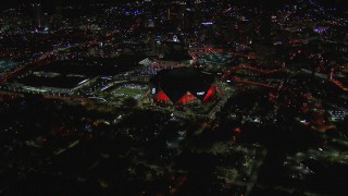 CAP_013_054 - HD stock footage aerial video of slowly approaching the stadium at nighttime, Atlanta, Georgia