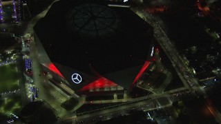 CAP_013_055 - HD stock footage aerial video a bird's eye view and orbit of the stadium at nighttime, Atlanta, Georgia