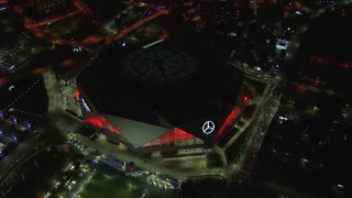 CAP_013_056 - HD stock footage aerial video of orbiting and flying away from the stadium at nighttime, Atlanta, Georgia