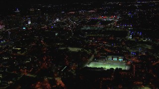CAP_013_081 - HD stock footage aerial video fly over Georgia Institute of Technology campus toward stadium at night, Atlanta, Georgia