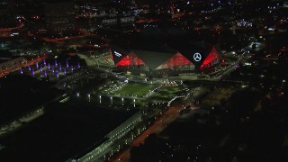 CAP_013_083 - HD stock footage aerial video of slowly flying toward the stadium at night, Atlanta, Georgia
