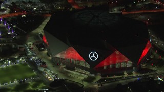 CAP_013_085 - HD stock footage aerial video of closely orbiting the stadium at night, Atlanta, Georgia