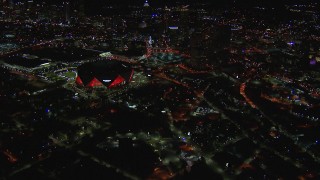 CAP_013_086 - HD stock footage aerial video of slowly flying toward and tilting to the stadium at night, Atlanta, Georgia