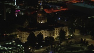CAP_013_090 - HD stock footage aerial video of an orbit of the state capitol building at night, Downtown Atlanta, Georgia