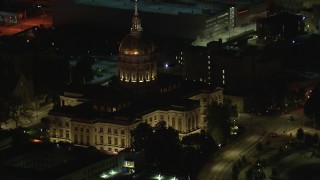 CAP_013_091 - HD stock footage aerial video of circling the state capitol building at night, Downtown Atlanta, Georgia