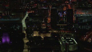 CAP_013_092 - HD stock footage aerial video of circling the state capitol building at night, zoom to wider view, Downtown Atlanta, Georgia