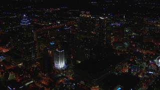 CAP_013_111 - HD stock footage aerial video flying away from the downtown skyline at night, Downtown Atlanta, Georgia