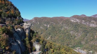 CAP_014_004 - 2.7K stock footage aerial video of approaching the rock formation and mountains at Chimney Rock in North Carolina
