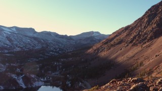CAP_015_033 - 4K stock footage aerial video wide view of mountain valley at sunset, Inyo National Forest, California