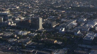 CAP_016_021 - HD stock footage aerial video orbit an approach to apartment and college buildings, Hollywood, California