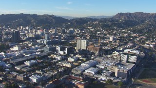 CAP_016_025 - HD stock footage aerial video reverse view of Emerson College and Hollywood office buildings, California