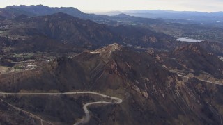 CAP_018_018 - HD stock footage aerial video of mountains scarred by fire, Malibu, California
