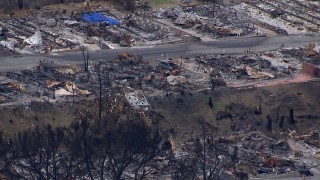CAP_018_034 - HD stock footage aerial video of a neighborhood devastated by fire, Malibu, California