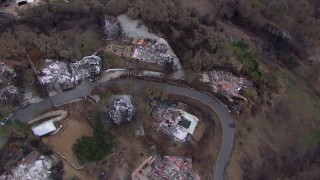 CAP_018_045 - HD stock footage aerial video approach homes destroyed by fire, Malibu, California