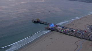 CAP_018_067 - HD stock footage aerial video of an orbit of Santa Monica Pier at sunset, California