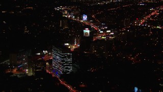 CAP_018_125 - HD stock footage aerial video of approaching the Sunset Strip at night in West Hollywood, California