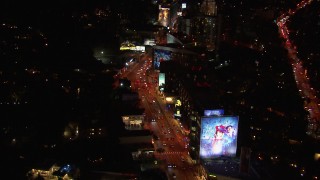 CAP_018_130 - HD stock footage aerial video of flying over the Sunset Strip at night in West Hollywood, California