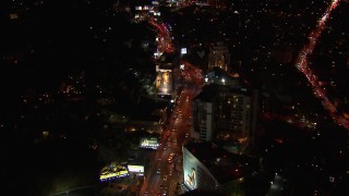 CAP_018_131 - HD stock footage aerial video of light traffic on the the Sunset Strip at night in West Hollywood, California