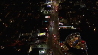 CAP_018_134 - HD stock footage aerial video of following Sunset Blvd at night through Hollywood, California