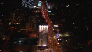 CAP_018_144 - HD stock footage aerial video fly over cars lining Sunset Strip at night in West Hollywood, California
