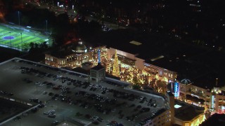 CAP_018_146 - HD stock footage aerial video of a Christmas tree at The Grove shopping mall at night in Los Angeles, California