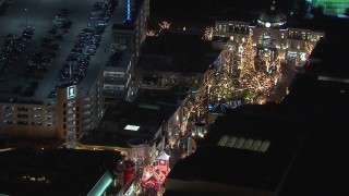 CAP_018_153 - HD stock footage aerial video of orbiting The Grove shopping mall at night in Los Angeles, California