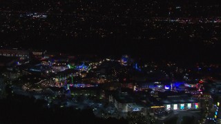 CAP_018_165 - HD stock footage aerial video of circling the Universal Studios Hollywood theme park at night, Universal City, California