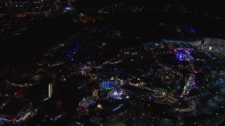 CAP_018_167 - HD stock footage aerial video of an orbit of the Universal Studios Hollywood theme park at night, Universal City, California
