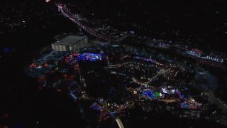 CAP_018_168 - HD stock footage aerial video of the Universal Studios Hollywood theme park at night, Universal City, California