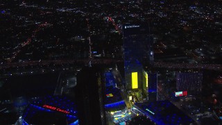 CAP_018_197 - HD stock footage aerial video of orbiting Ritz-Carlton Hotel at night, Downtown Los Angeles, California